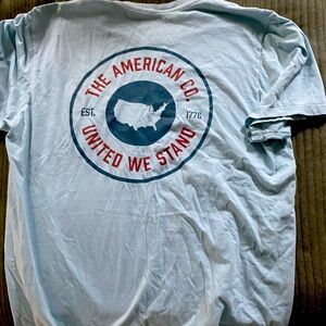 light blue aftico with dark blue usa on the back